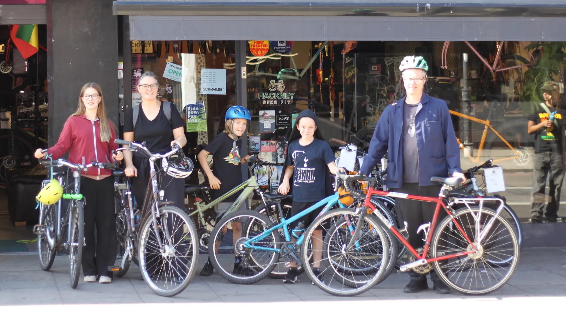Family learning bicycle maintenance together